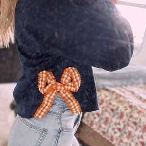 Bow Cut-Out Round Neck Sweater