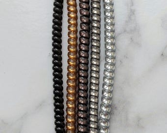 Hearing aid tube and Cochlear implant wire coils