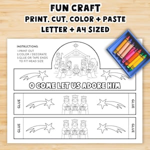 May include: A black and white paper craft with the text "O COME LET US ADORE HIM" and illustrations of the nativity scene and stars. A blue crayon box with colourful crayons is on the right. The text "FUN CRAFT" is at the top.