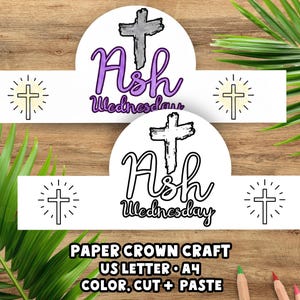 May include: Two paper crown crafts with the text "Ash Wednesday" and a cross design. The crowns are white with purple and black text. The image also includes the text "Paper Crown Craft US Letter A4 Color, Cut + Paste."