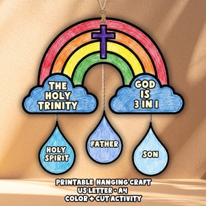 May include: A colorful, printable hanging craft featuring a rainbow with a purple cross, clouds with text, and teardrop shapes. The text includes "The Holy Trinity," "God is 3 in 1," "Holy Spirit," "Father," and "Son."