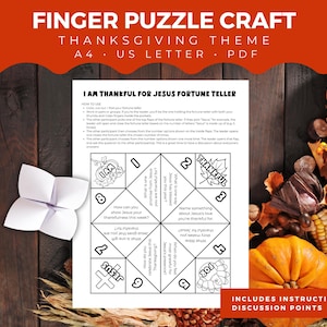 May include: A4 PDF Thanksgiving-themed finger puzzle craft featuring the text "I AM THANKFUL FOR JESUS FORTUNE TELLER". The image shows a white paper fortune teller, pumpkins, and the text "INCLUDES INSTRUCTIONS + DISCUSSION POINTS".
