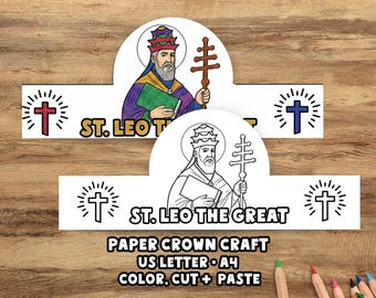 May include: Two paper crown crafts featuring St. Leo the Great, one colored and one black and white. Each crown has a cross design and the text "ST. LEO THE GREAT". The bottom of the image reads "PAPER CROWN CRAFT US LETTER A4 COLOR, CUT + PASTE".