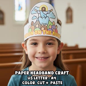 May include: A young person wearing a paper headband craft with the text "SERMON ON THE MOUNT". The headband features a colorful illustration of Jesus and people. The text "PAPER HEADBAND CRAFT US LETTER • A4 COLOR, CUT + PASTE" is at the bottom.