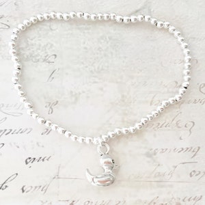 Silver Duck Charm Bracelet: 3mm Beaded Stretch Bracelet