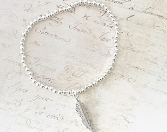 Silver Feather Charm Bracelet: Ball Bead Stretch Bracelet