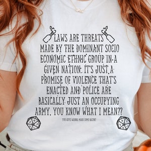 Koszulka Laws Are Threats, Dimension 20, DnD Koszulka Brennan Lee Mulligan D&D Unisex Koszulka z krótkim rękawem