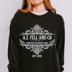 Good Omens Long Sleeve Shirt: A.Z. Fell Antiquities Graphic Tee