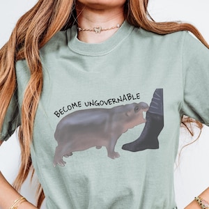Ostyrbar flodhäst-T-shirt: Rolig rebellisk meme-grafik-T-shirt