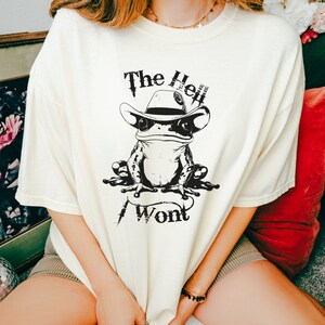 Cowboy Frog Shirt, The Hell I Won’t Tee, Western Funny Frog Graphic T-Shirt, Cottagecore Cowboycore Gift, Country Rebel Shirt