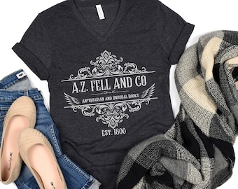 Maglietta con scollo a V Good Omens A.Z. Fell and Co: regalo per amanti dei libri