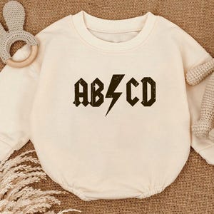 Rock and Roll Baby Romper: ABCD Rockstar Bodysuit