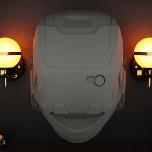 May include: A grey helmet, possibly for cosplay or display, is mounted on a dark wall. Two spherical wall sconces with warm yellow light flank the helmet. A decorative illustration of a helmet is above the left sconce.