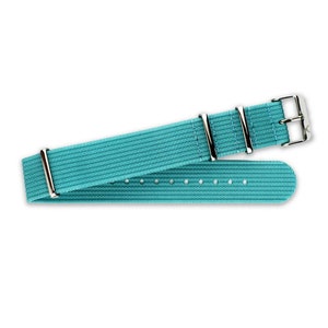May include: A turquoise blue nylon watch strap with silver metal buckle and keepers.