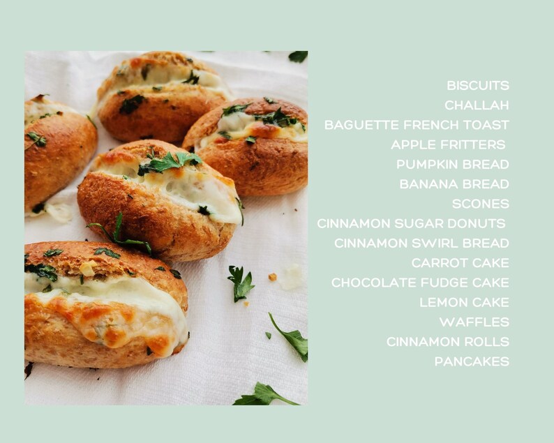 May include: Close-up of several baked rolls filled with melted cheese and garnished with fresh parsley, arranged on a white cloth. The rolls have a golden-brown crust. Text on the right lists various baked goods including biscuits and challah.