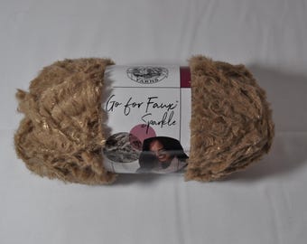 Lion Brand Go for Faux Sparkle Yarn: Jupiter Tan, Super Bulky (56 yds)