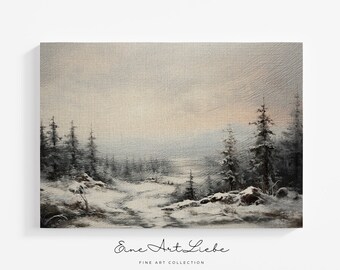 May include: A rectangular canvas print featuring a winter landscape painting with snow-covered ground, dark evergreen trees, and a pale, overcast sky. Below the artwork, the text reads "Eine Art Liebe" and "FINE ART COLLECTION".