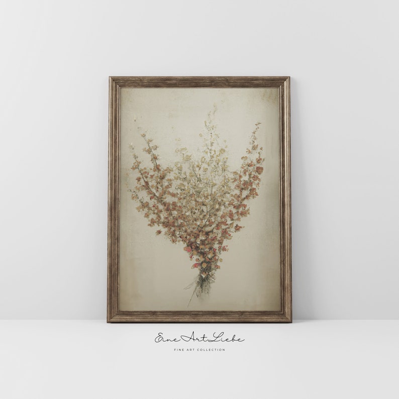 May include: A framed print of a dried flower bouquet in shades of brown, beige, and pink. The bouquet is arranged in a vase-like shape and is tied with a string at the bottom. The print has a vintage aesthetic and is framed in a simple, gold-toned frame.