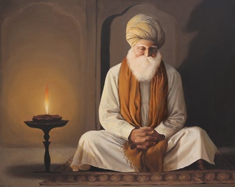 May include: A man wearing a white robe and a turban sits cross-legged on a rug with his eyes closed. He has a long white beard and is holding his hands together in front of him. A small oil lamp with a flame is burning in front of him.