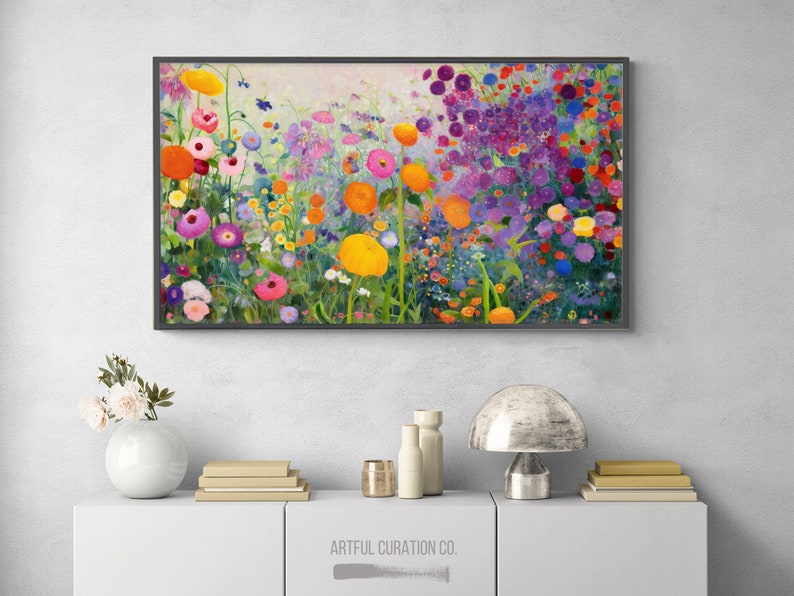 May include: A framed painting of a colorful flower garden with a variety of flowers in shades of pink, purple, yellow, and orange. The flowers are arranged in a loose, natural pattern, and the background is a soft, muted green.