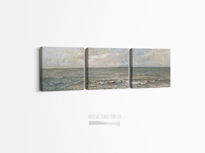 May include: A triptych of canvas art prints depicting a seascape. The artwork features a muted color palette of blues, grays, and beige, with visible brushstrokes. The ocean waves and sky are the primary subjects. The text "ARTFUL CURATION CO." is at the bottom.