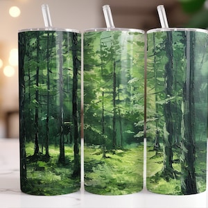 May include: Three stainless steel tumblers with a green forest scene painted on them. The tumblers have lids and straws.