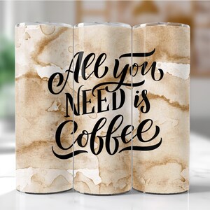May include: Three stainless steel tumblers with a brown and white watercolor background. The tumblers have the text "All you need is coffee" in black cursive lettering.