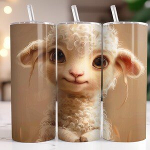 May include: A set of three stainless steel tumblers with a cute cartoon lamb design. The lamb is white with a fluffy coat and big brown eyes. The tumblers are a light brown color with a subtle texture.