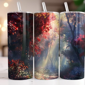 May include: Three stainless steel tumblers with a forest scene design. The tumblers feature a dark forest with red and blue hues, and a path leading through the trees.