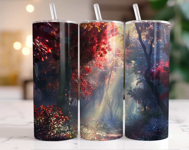 May include: Three stainless steel tumblers with a forest scene design. The tumblers feature a dark forest with red and blue hues, and a path leading through the trees.