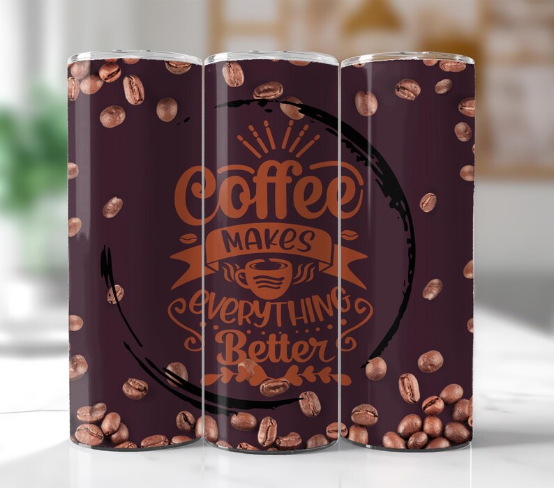 May include: Three stainless steel tumblers with a brown background and a coffee bean pattern. The tumblers have the text "Coffee makes everything better" in a copper color.