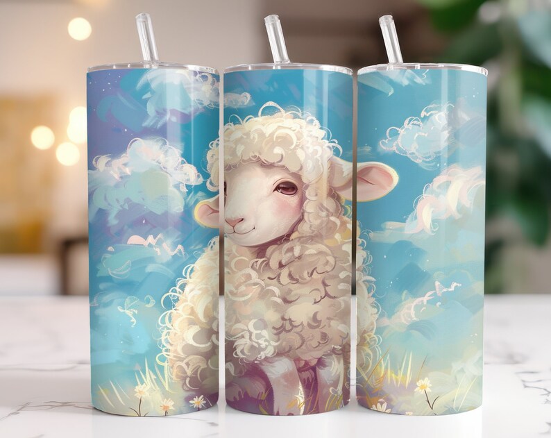May include: Three stainless steel tumblers with a white fluffy lamb illustration against a blue and white cloudy sky background. The tumblers have a straw and a lid.