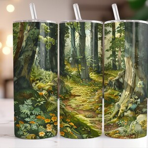 May include: Three stainless steel tumblers with a forest scene design. The scene features a path through a lush green forest with tall trees and a mossy ground.