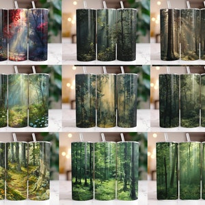May include: Set of three 20 oz stainless steel tumblers with a forest scene design. The tumblers feature a variety of forest scenes, including a sunlit path through the trees, a misty forest, and a dense forest with tall trees.