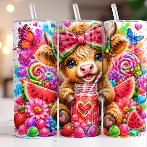 May include: A cylindrical tumbler featuring a fluffy brown calf with a watermelon-patterned bow, holding a jar of pink drink. The design includes vibrant splashes of color, butterflies, watermelon slices, strawberries, flowers, and candy.