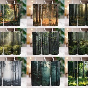 May include: Set of nine 20 oz stainless steel tumblers with different forest scenes. The tumblers feature various shades of green, brown, and gray, depicting a variety of forest landscapes.