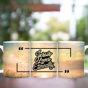 May include: Three white ceramic mugs with a sunset background. The middle mug has the text "Jesus Loves Eternally" in black lettering with a yellow outline. The left and right mugs have quotation marks.