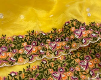 Yellow Organza saree with floral embroidery Along with Green Color Stitched Blouse and Pico(fall)