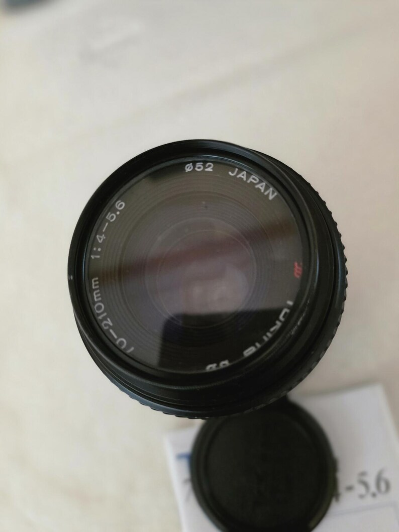 Objetivo zoom macro Tokina SZ-X210 70-210 mm f/4-5.6 con montura Nikon F y manual. imagen 5