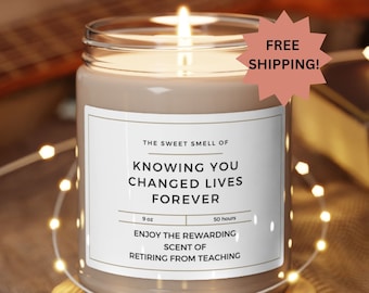 May include: A brown candle with a white label that reads "The Sweet Smell of Knowing You Changed Lives Forever". The candle is 9 oz and has a burn time of 50 hours. The label also says "Enjoy the Rewarding Scent of Retiring from Teaching".