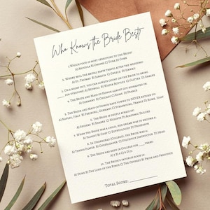 May include: A printable game card with the title "Who Knows the Bride Best?" and a list of ten multiple-choice questions about the bride. The questions are about her preferences, travel destinations, and childhood dreams.