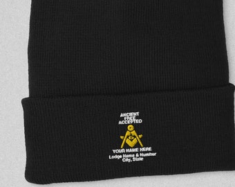 May include: Black knit beanie with a white embroidered design that says "Ancient Free and Accepted Masons" with a compass and square symbol. The text also says "Your Name Here, Lodge Name & Number, City, State".