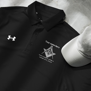 May include: Black polo shirt with a white embroidered compass and square, with the text "Your name here", "YOUR LODGE & LODGE #", "LODGE CITY, STATE".