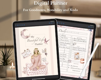 May include: Two digital tablets displaying a digital planner. The left tablet shows a planner page with the text "My Beautiful Life Planner" and illustrations. The right tablet displays a daily planner layout. The text "Digital Planner" is at the top.