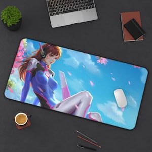 May include: A rectangular desk mat featuring a digital illustration of a character with brown hair wearing a blue and white futuristic suit with pink accents. The background depicts a bright blue sky with scattered pink cherry blossom petals.
