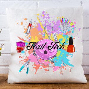 May include: A white pillow with a colorful design featuring nail art tools, including a nail drill, nail clippers, nail polish, and nail files. The text "Nail Tech" is written in a bold, black font.