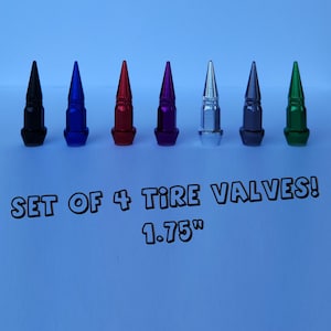 May include: Set of 4 tire valve stems in black, blue, red, purple, silver, gray, and green. The valve stems are 1.75 inches long.
