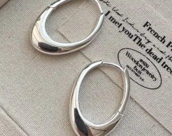 Trendy Modern Oval Silver Hoop Earrings:  Rhodium Plated Over 925 Sterling Silver. #1114