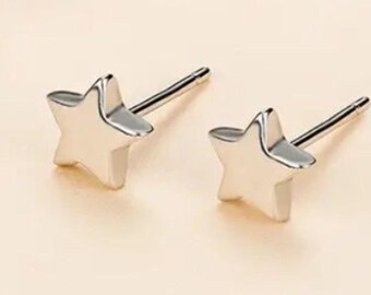 Trendy Silver Star Stud Earrings: Rhodium Plated Over 925 Sterling Silver. #1115