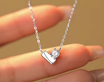 Contemporary Zircon Heart Pendant Necklace: Rhodium Plated Over 925 Sterling Silver. #1094